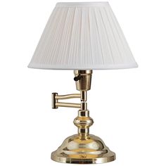 Tradition is long-lasting for a reason, and the design of this creation from Kenroy Home makes that clear. With an alluring base crafted from metal and given a tasteful polished brass finish, it complements surrounding furnishings and accents. This polished brass swing-arm desk lamp includes a pleated cone shade and a swing-arm function to direct lighting to targeted areas. Gear Decor, Classic Desk, Traditional Lamps, Vintage Light Fixtures, Kids Gear, Direct Lighting, Lamps For Sale, Brass Table Lamps, Brass Lamp