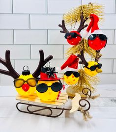 a sleigh with sunglasses and hats on it