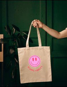 Fabric bag smiley, shoulder bag, smiley jute bag, shopping bag with smiley, shopper, neon pink, farewell gift, birthday gift Our shopper is the perfect shopping bag, it combines style and functionality and is the perfect companion for your everyday life. The smiley jute bag is made of 100% cotton and offers enough space for everything you need - be it for shopping, university or the beach. With our unique design you stand out from the crowd and make a statement. The attractive graphics give your Playful Pink Cotton Bag, Fun Pink Cotton Bag, Trendy Pink Canvas Bag For Gift, Trendy Pink Canvas Bag As Gift, Pink Eco-friendly Canvas Bag For Shopping, Pink Eco-friendly Canvas Shopping Bag, Eco-friendly Pink Canvas Shopping Bag, Eco-friendly Pink Canvas Gift Bag, Jute Bag