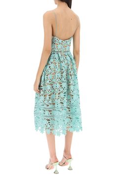 Sacai dress crafted in embroidered floral lace. Characterized by a waisted bodice with scoop V-neck and spaghetti straps, this model boasts a pleated circular skirt, back zipper closure and lined interior. Regular fit with midi length. The model is 177 cm tall and wears size UK 8. Size Info UK Color Detail Light blue Made In China Material 100%PL Season One spring Season Two summer Product clothing Brand Self Portrait Size And Fit A-line Lace Midi Dress For Garden Party, Evening Midi Dress With Delicate Lace, Tea-length Scalloped Lace Dress, Lace Midi Dress For Evening In Tea Length, Evening Lace Midi Dress In Tea Length, Lace Tea Length Midi Dress For Evening, Lace Tea-length Evening Midi Dress, Delicate Lace Midi Dress For Wedding, Evening Lace Tea Length Midi Dress