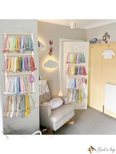 a baby's room is decorated in pastel colors