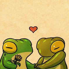 two green frogs sitting next to each other on top of a piece of paper with a heart in the background