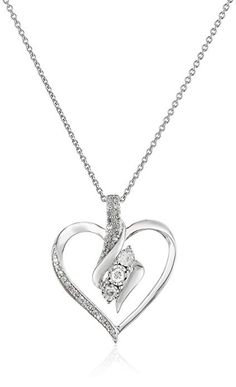 Sterling silver necklace featuring diamond-accented open heart pendant with hanging trio of diamonds at center Rolo chain The total diamond carat weight listed is approximate. Variances may be up to .03 carats. All our diamond suppliers confirm that they comply with the Kimberley Process to ensure that their diamonds are conflict free. Imported قلادات متدلية, Diamond Heart Pendant Necklace, Heart Shaped Pendant Necklace, Pendant Diamond, Heart Pendants, Heart Pendant Diamond, Stone Pendant Necklace, Stone Heart, Diamond Pendant Necklace