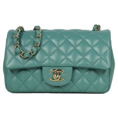 Chanel Seafoam Green Lambskin Quilted Rectangular Mini Flap Bag Made In: Italy Color: Seafoam green Hardware: Brushed goldtone Materials: Lambskin leather Lining: Smooth leather Closure/Opening: Flap top with CC twistlock Exterior Pockets:One back patch Interior Pockets: One slip and one zipper Exterior Condition:Excellent pre-owned condition Interior Condition: Excellent pre-owned condition Includes:Chanel box and dustbag Measurements: 7.75"L x 4.75"H x 2.5"D Strap Drop: 22.5" Green Bag Chanel, Chanel Lambskin Bag, Chanel Mint Green Bag, Chanel Xl Flap Bag, Quilted Handbag, Trending Handbags, Chanel Box, Vintage Crossbody Bag, Chanel Vintage Classic Double Flap Bag Quilted Lambskin Medium