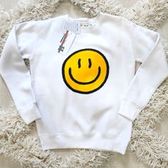 New With Tags Is Super Cute For Any Kiddo Cute Yellow Long Sleeve Sweatshirt, Cute Yellow Sweatshirt For Fall, Fun Yellow Tops For Fall, Fun Yellow Fall Tops, Cute Yellow Crew Neck Sweatshirt, Playful White Top With Smiley Face, Playful Yellow Long Sleeve Top, Winter Crew Neck Top With Smiley Face, Crew Neck Top With Smiley Face For Winter