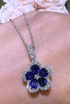 Indulge in luxury with our 2.61ct tw royal blue sapphire and diamond pendant necklace. The striking royal blue sapphire paired with shimmering diamonds will add elegance to any attire. Made with high-quality materials, it is a timeless piece that will make you feel like royalty. Metal: 18K White Gold35 Diamond Weight: 0.43ct tw Round - cuts 5 Blue Sapphires Weight: 2.18ct tw Pear - cuts Dimensions: 11mm / Chain: 18mm Necklace Guide, Diamond Initial Necklace, Jewelry Appraisal, Bridal Engagement Rings, Eternity Wedding Band, Jewelry Rings Diamond, Colored Gems, Jewelry Repair, Engagement Ring Wedding Band