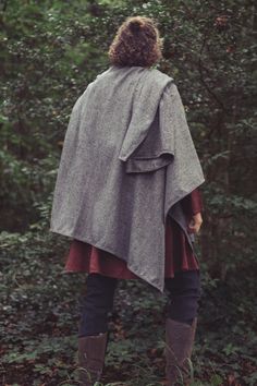 This cloak gives you the feeling of standing on an Irish cliffside at dawn. But the chilly wind of Ireland is best enjoyed in warmth! The Ruana cloaks are made in the traditional style with an amazing selection of beautiful wool fabrics to keep you warm and dry as you listen to crashing waves. *Please note that our wool fabric comes from small dye batches, colors may vary due to screen settings.* Exchange/Return Policy Complete the look with Pose Wigs! She is wearing Bloom True Silver - Lace Fro Medieval Style Fall Cape Outerwear, Bohemian Wool Cape Outerwear, Medieval Style Fall Cape, Medieval Style Cape For Larp In Fall, Bohemian Wool Cape For Fall, Medieval Cape For Larp In Fall, Medieval Cape For Fall Larp Events, Medieval Style Winter Cape Outerwear, Medieval Winter Cape Outerwear