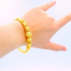 This Shop has a Special Free Gift (Chain) for Every Order. 😊🙏 Item: 1 x Bangle Bracelet For: Women Type: GOLD PLATED over Brass, Nickel free Purity: 96.5% Surface: Shiny Diameter: ~6 centimetre Circumference: ~20 centimetre Thickness: ~ 5 mm Weight:~ 30 grams Color: Yellow Gold ( slightly +/- from photo ) Handmade from Thailand. Thai gold plating technic really solid and stunning look. Rewarding your life from hard working, match up your dress, bridesmaid wedding engagement or a gift to someon Gold Jubilee Bracelet For Wedding, Handmade Gold Bracelet With Round Beads, Gold-plated Gold Bracelets For Wedding, 22k Gold Jubilee Bangle Bracelet, Yellow Gold Bracelet With Gold Beads For Wedding, Gold Jubilee Bracelet Bangle For Wedding, Gold Plated Bracelets For Anniversary, Adjustable Gold Plated Bracelet For Festive Occasions, Gold Bangle With Round Beads For Wedding