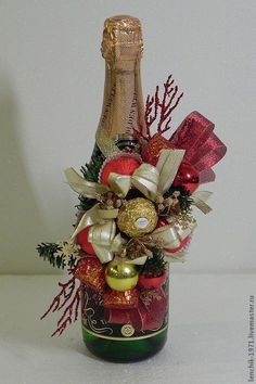 a bottle filled with lots of different types of decorations