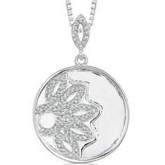 This unique pendant blends classic floral motifs with a contemporary bejeweled setting. It features a round disc intricately engraved and encrusted with 83 dazzling round white diamonds. The smooth edge accentuates the floral pattern and enhances the gem-studded beauty, with a lavish white gold tone giving it a high-end look. The pendant has an oval gem-encrusted bail that gently suspends the medallion on a silver box chain with a secure clasp. Wear this luxurious pendant with trendy turtlenecks or formal outfits for ultimate Hollywood glamour. Main Stone Cubic Zirconia Metal .925 Sterling Silver Rhodium Plated Finish 925 stamp, 3.7 grams Sizing Pendant measures 1.5 x 1 inches Includes A matching tone 18 inch Sterling Silver Box chain with spring-ring clasp A Peora jewelry gift box Birthst Alexandrite Necklace, Ring Necklace Men, Blue Sapphire Bracelet, Peridot Bracelet, Floral Pendant Necklace, Blue Sapphire Necklace, Wedding Anniversary Rings, Amber Bracelet, Formal Outfits