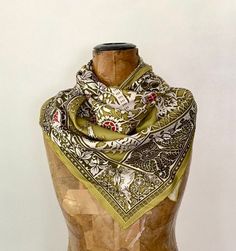 100 percent chartreuse silk scarf adorned with a tree of life and nature elements. This beautiful accessory is perfect for any occasion and as a gift, can be styled in numerous ways. Bohemian Green Silk Scarf As Gift, Green Bohemian Silk Scarf As Gift, Green Shawl Scarf As A Gift, Green Bohemian Silk Scarf For Gift, Green Silk Bohemian Scarves, Bohemian Green Silk Scarves, Handmade Bohemian Green Silk Scarf, Handmade Green Bohemian Silk Scarf, Green Bohemian Silk Scarf