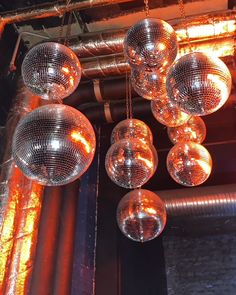 shiny disco ball lights hanging from the ceiling