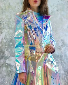 ▲▲Happy Shopping  Jacket features iridescent holo fabric and transparent holographic material .  Would be perfect for photoshoot , or an alien costume or everyday wear.  Unisex   This one is more comfortable ,  the sleeve is mix with soft iridescent fabric just like a leather.  Different light have different effect , have fun and charm everywhere. For made to order ,  please mention your size when you pay an order.  Size we need : Waist , shoulder , Chest , sleeve length, arm circumference (Plea Holographic Jacket, Holographic Material, Holographic Fabric, Iridescent Fabric, Alien Costume, Rave Party, Music Festival Outfit, Clear Vinyl, Fantasy Clothing