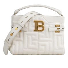 Color: White Golden Jewelry Dimensions: 22cm X 22cm X 8cm Beige Suede Lining Details Categories: Women Category: Bags - Sub-Category: Handbags Designer: Balmain Model: Bbuzz Condition: Good Condition - Material: Leather - Colour: White White Rectangular Shoulder Bag With Logo Hardware, White Logo Shoulder Bag For Formal Occasions, Formal White Shoulder Bag With Logo, White Leather Shoulder Bag With Logo, White Rectangular Shoulder Bag With Embossed Logo, Luxury White Shoulder Bag With Embossed Logo, Elegant White Bag With Embossed Logo, Luxury White Bag With Logo, White Luxury Bag With Logo