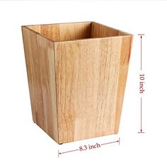 a close up of a wooden container on a white background with measurements for the width