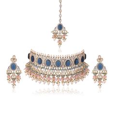 *PRODUCT DETAIL* * Material: Brass * Plating: Gold Plated * Stone: Semi Precious Kundan & Pearl *DIMENSIONS * * Necklace- Weight: 141 gm Length 8.3 Inches Width: 3.2 Inches * Earrings- Weight: 18 gm Each, Length: 3.5 Inches, Width: 1.25 Inches * Tikka: Weight: 23 gm Each, Length: 3 Inches, Width: 1.25 Inches, Top Chain Length: 2 Inches *ABOUT PRODUCT* * Beautiful Jadau Kundan Choker Necklace with Pink Bead Highlights * Style Tip : Stunning Piece of Jewelry to get you noticed. *DISCLAIMER* * Blue Kundan Necklace For Reception Festivities, Blue Kundan Necklace For Festive Reception, Blue Kundan Necklace For Reception And Festive Occasions, Blue Kundan Necklace For Reception, Blue Kundan Necklaces For Reception, Blue Bollywood Jewelry For Reception, Festive Blue Jewelry For Reception, Festive Blue Kundan Necklace With Cutdana, Festive Blue Kundan Bridal Necklace