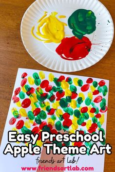 an apple theme art project for kids with paper plates and paint on the table next to it