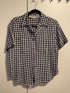 Quality vintage blue and white checkered linen shirt in good condition.  Size Medium, Kenar petites. Spring Plaid Linen Shirt, Classic Plaid Linen Shirt, Classic Plaid Shirt For Summer, Casual Plaid Linen Tops, Casual Collared Gingham Shirt, Casual Gingham Collared Shirt, Classic Short Sleeve Plaid Top, Classic Short Sleeve Summer Flannel Shirt, Classic Short Sleeve Flannel Shirt For Summer