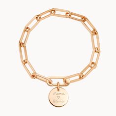 Forever linked by love. Featuring an iconic hinge to clip on your hand-engraved charms, this personalized link bracelet can be hand-engraved with your special words or messages.Available in 18K Champagne Gold PlatedCharm: 0.6 Diameter, 0.03 ThicknessChain length &amp; style: 7.3 Thick Trace ChainCharms are removable from this chain and can be worn with other Merci Maman charmsHand-engraved in our Paris workshopSent with love in a complimentary gift boxAny slight variations in lettering depth Engraved Classic Charm Bracelet, Personalized Chain Link Bracelet Gift, Engraved Charm Bracelet For Personalized Gift, Personalized Engraved Charm Bracelet, Elegant Engraved Rose Gold Charm Bracelet, Engraved White Gold Charm Bracelet, Charm Bracelet With Solid Links As A Gift, Engraved Chain Link Jewelry Gift, Personalized 14k Gold Chain Bracelet