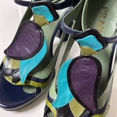 condition 9/10 color blue × purple × green size 36.5 (us 6.5, uk 3.5) insole 24cm, width 8cm, heel height 10cm, platform height 2cm the sole of the right heel is slightly chipped. made in italy free shipping worldwide (takes around 5days) Green Sandals With Sculpted Heel, Green Sandals With Sculpted Open Heel, Green Open Toe Sandals With Sculpted Heel, Green Leather Sandals With Sculpted Heel, Luxury Green Heels For Spring, Luxury Green High Heel Sandals, Designer Green Open Toe Sandals, Luxury Green Platform Heels, Designer Green Platform Heels