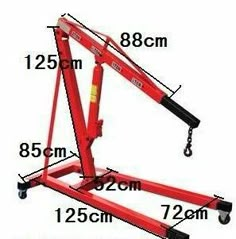 an image of a red scissor on wheels with measurements for the height and width