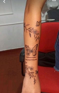 Flower Vine Sleeve Tattoos For Women, Tattoos That Go With Butterflies, Lotus Flower Wrap Around Arm Tattoo, Vine And Butterfly Tattoos For Women, Butterfly With Vines Tattoo, Hibiscus Butterfly Tattoo, Butterfly Tattoos For Women Arm, Quad Tattoos Women, Tattoos Wrapped Around Arm