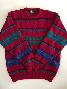 Vintage Pendleton Sweater. Love Yummy cranberry red w blue, turquoise and black native pattern.Southwestern / Aztec Inspired.A softness to this sweater.Perfect for your holiday gathering.For men or woman.Size LFor a smaller size, wear bulky and toasty!Please refer to measurements!!Approximate Measurements:Underarm to underarm- 23".  - Double this.  Additional stretch with the wool.Sleeve length - 31" - Measured from lower portion  of crew collar.Length - 30" From top, center of back to hem.I hav Casual Red Sweater For Cold Weather, Red Bohemian Sweater For Winter, Casual Multicolor Fair Isle Sweater, Pendleton Sweater Women, Red Nordic Sweater With Crew Neck, Native Sweaters, Southwestern Sweater, Red Bohemian Winter Sweater, Pendelton Sweater