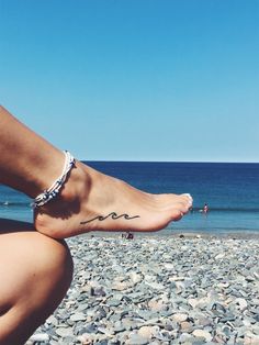 a woman's foot with the word love written on it