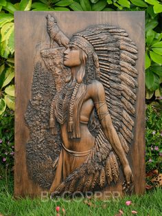 A Native American wood carving featuring a woman is a beautiful and symbolic piece of art that can add a touch of culture and spirituality to any room. With its intricate details and graceful design, this carving can be a stunning centerpiece or focal point of any space.Women hold a special place in Native American culture. They are often revered as caregivers, healers, and spiritual leaders. A wood carving of a Native American woman can serve as a powerful symbol of these values, and can be ... Art Sculpture En Bois, Norse Goddess Of Love, Home Sculpture, Viking Decor, Odin's Ravens, Wolf Wall Art, Norse Goddess, Norse Pagan, Sculpture Wall