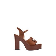 Gucci smooth calf leather platform sandals with GG logo cutout 4.75 in / 120 mm block heel; 1.25 in / 30 mm platform Open toe Adjustable ankle strap Made in Italy Cutout Heels, Leather Platform Sandals, Gg Logo, Platform Sandals, Calf Leather, Block Heels, Ankle Strap, Open Toe, Clothing And Shoes