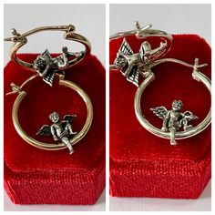 "Stylish adorable and very detailed Cherub/Angel Hoops ~ These cute cherubs we have one sitting while the other one is lounging ! The hoops are shiny 10k yellow gold, the cherubs are sterling silver. My hoops are solid gold NOT hollow Patented Design ERA- 2022 METAL / MATERIAL - 10k yellow gold/ Sterling Silver MARKINGS / HISTORY - Earrings are marked \"10k\" CONDITION - New Weight (both earrings): 4.42 grams" Handmade Silver Hoop Earrings For Valentine's Day, Vintage Hypoallergenic Hoop Earrings Gift, Vintage Hoop Earrings As A Gift, Adjustable Charm Hoop Earrings As Gift, Gift Hoop Earrings With Charms, Adjustable Hoop Earrings With Charms As Gift, Charm Hoop Earrings For Gift, Gift Hallmarked Huggie Hoop Earrings, Hoop Earrings With Charms For Gift