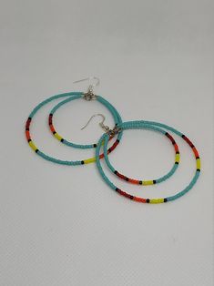 Large Beaded Hoop Earrings Orange Double Hoops Turquoise Hoop - Etsy Turquoise Beaded Dangle Hoop Earrings, Southwestern Style Beaded Dangle Hoop Earrings, Turquoise Dangle Hoop Earrings With Colorful Beads, Turquoise Hoop Earrings With Dangling Beads, Nickel-free Southwestern Hoop Earrings, Bohemian Adjustable Hoop Earrings With Spacer Beads, Adjustable Bohemian Hoop Earrings With Spacer Beads, Southwestern Dangle Hoop Earrings With Ear Wire, Southwestern Jewelry With Round Beads For Pierced Ears