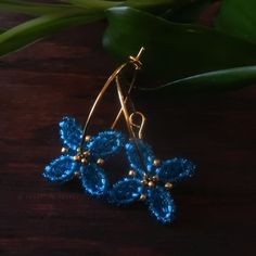 Heart in Hawaii Beaded Quatrefoil Hoops - Blue Blue Small Hoop Beaded Earrings With Dangling Beads, Blue Small Hoop Earrings With Tiny Beads, Blue Dangle Hoop Earrings With Tiny Beads, Beaded Sunflower, Sunflower Brooch, Tree Heart, Mini Sunflowers, Beaded Jewlery, Brass Hoops