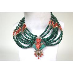 This is part of Chairish’s Fine Jewelry assortment.  Perfect for a Socialite from a Palm Beach Socialite Collection!   Turn heads in this enchanting colorful vintage victorian collar necklace. Stunning combination of green malachite, coral beads, 14-karat beads, 14 K.slide clasp- featuring a pair of carved coral roses surrounded by carved gold articulated leaves upon a diamond shaped slab of malachite with gold and coral hanging beads.finest 14 K. gold nicely articulated designer slide clasp that locks in, also has a safety closure.  Stamped on the clasp 14-karat.---8 in. end to end wide collar--x 7 1/2 in. back to front  Elegant stylish necklace worn by a stylish Palm Beach Socialite!  Please reference the measurements noted in the description above for the best approximate dimensions. Pl Ceremonial Green Beaded Jewelry, Green Beaded Jewelry For Ceremonial Occasions, Handmade Victorian Green Necklaces, Traditional Handmade Emerald Necklaces, Vintage Malachite Jewelry For Gifts, Traditional Handmade Emerald Necklace, Vintage Malachite Jewelry Gift, Handmade Elegant Malachite Beaded Necklaces, Unique Green Jewelry For Ceremonial Occasions