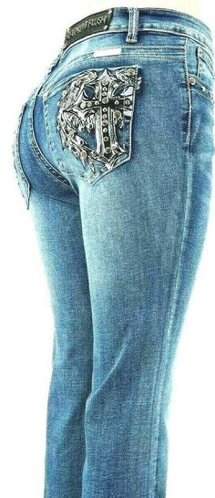 This Listing is for (1) Platinum Plush Ladies  5 Pocket Blue Denim Boot Cut Jeans  with a Leather Cross & Wing Sequence Embellished in Rhinestones Style# 4046   Material Cotton 69% polyester 29% Spandex 2% INSEAM MEASURES APPROX. 31 INCHES Measure Up 1. Bust Using a tape measure, take a loose measurement over the fullest part of your bust. 2. Waist Using a tape measure, measure around your body at the narrowest part of your waist. The natural crease your body makes when bending to the side also represents the narrowest part of your waist. 3. Hips Stand with your heels together and use a tape measure to measure around your body at the fullest part of your hips and rear. 4. Inseam Using a pair of pants that fit you best, use a tape measure to measure from the top inner thigh to the bottom of Platinum Plush Jeans, Medium Wash Rhinestone Denim Jeans, Bling Low Rise Jeans, Low Rise Bling Jeans, Rhinestone Denim, Miss Me Jeans Size 25, Denim Jeans Fashion, Denim Boots, Inner Thigh