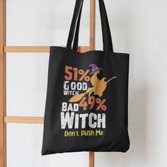 a black tote bag that says 5 % good witch bad witch don't push me