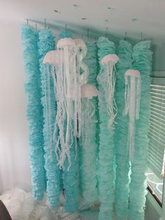 there are jellyfish hanging from the ceiling