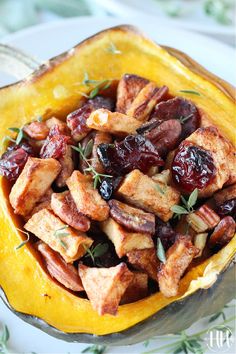 Up close photo of baked apples, pecans and cranberries in an acorn squash. Gf Stuffing, Maple Roasted Acorn Squash, Stuffed Acorn Squash Vegetarian, Gluten Free Thanksgiving Side Dishes, Cornbread Stuffing Recipes, Gluten Free Thanksgiving Recipes, Roasted Acorn Squash, Gluten Free Cornbread, Cornbread Stuffing