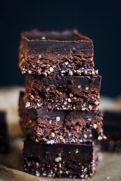 chocolate brownies stacked on top of each other