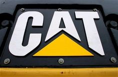 the back end of a yellow vehicle that says cat