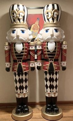 two nutcrackers are standing next to each other