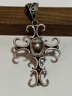 "This is a beautiful, vintage, genuine, sterling silver cross pendant that is huge! The cross measures about 3 3/8\" by 2\" (about 2 3/4\" in length without its bale). The bale opening is about 3/4\". The cross pendant has a gorgeous scroll work design and is very ornate and stunning. The pendant weighs about 29.6 grams and is stamped 925. It can be worn on a sterling silver chain or even a beaded necklace. Very pretty. See pictures for details. More gorgeous jewelry here, and some on BIG clearance in my shop:  www.etsy.com/shop/BargainBitz" Vintage Crucifix Cross Necklace As Gift, Vintage Crucifix Cross Necklace Gift, Vintage Handmade Cross Pendant Necklace, Antique Cross Pendant Necklace As Gift, Antique Cross Pendant Necklace For Gift, Vintage Sterling Silver Cross Necklace Gift, Vintage Silver Sterling Silver Cross Necklace, Vintage Sterling Silver Cross Pendant Necklace, Vintage Sterling Silver Cross Necklace