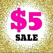 a pink and gold sale sign with the words $ 5 on it in black text