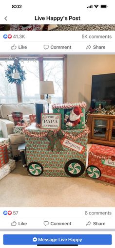 christmas presents are stacked on top of each other in front of a window with a holiday theme