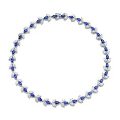 This exquisite 43.69 carat sapphire diamond Deco necklace features 18k white, yellow, or rose gold and 34 pear shaped sapphires totaling 18.24 carats, as well as 68 marquise diamonds totaling 16.80 carats. Its iconic Deco design of intersecting curves enhances the brilliance of the diamonds, making this necklace a stunning addition to any outfit. Yellow And White Diamond Necklace, Chloe 2024, Diamond Jewlery, Sapphire Diamond Necklace, White Diamond Necklace, Expensive Jewelry Luxury, Jewelry Luxury, Blue Tanzanite, Expensive Jewelry