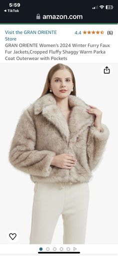 a woman wearing a fur coat and white pants is shown on the amazon store page