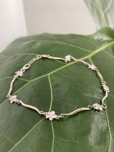 "PLUMERIA STERLING SILVER ANKLET This genuine 925 sterling silver anklet features the plumeria flower.   Makes a great gift or addition to your Hawaiian jewelry collection. Material: 925 STERLING SILVER Length available: 9\" or 9.5\" Closure:  Lobster Clasp Quantity:  1 Bracelet" Feminine Silver Flower Jewelry, Cute Jewelry Silver, Cute Silver Flower Jewelry, Silver Bracelet Jewelry With Flower Charm, Silver Summer Jewelry, Delicate Silver Flower Bracelets, Cute Silver Jewelry, Luxury Silver Flower Bracelets, Sterling Silver Anklets