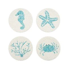 four coasters with blue sea animals and starfish on the bottom one has a white background