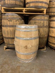 several wooden barrels stacked on top of each other