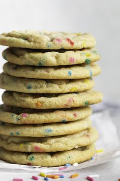 a stack of cookies with sprinkles on top